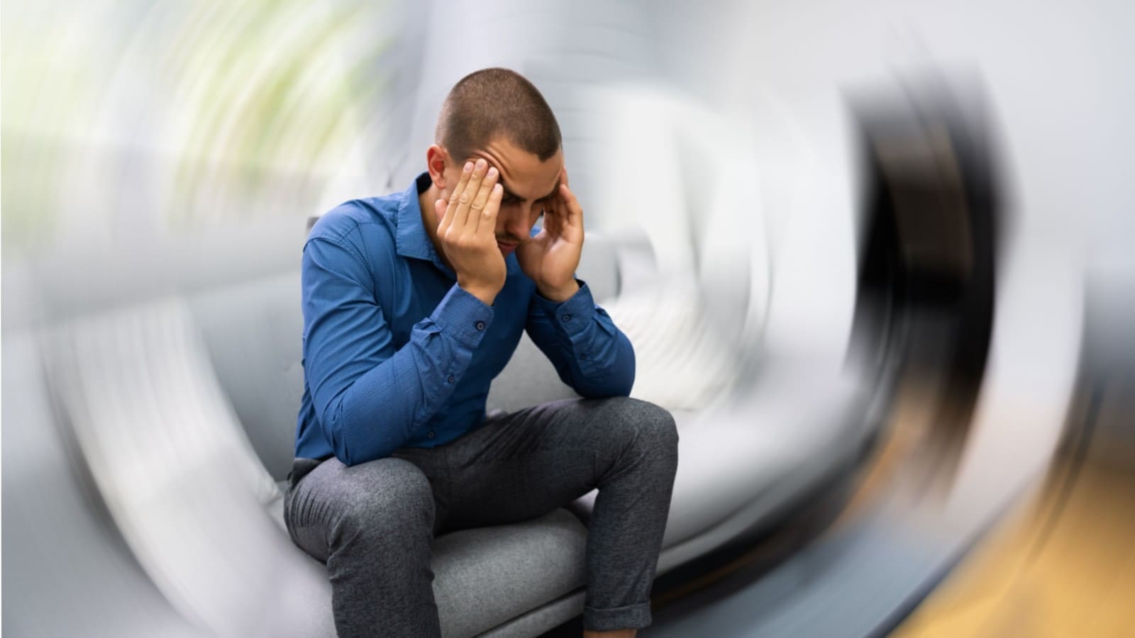 Man suffering from vertigo